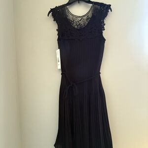 Sleeveless Black Midi Dress with Lace Yoke and Pleated Skirt
